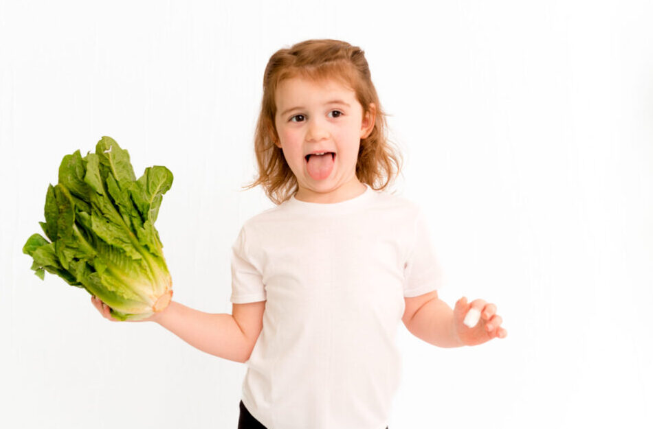 Child with lettuce