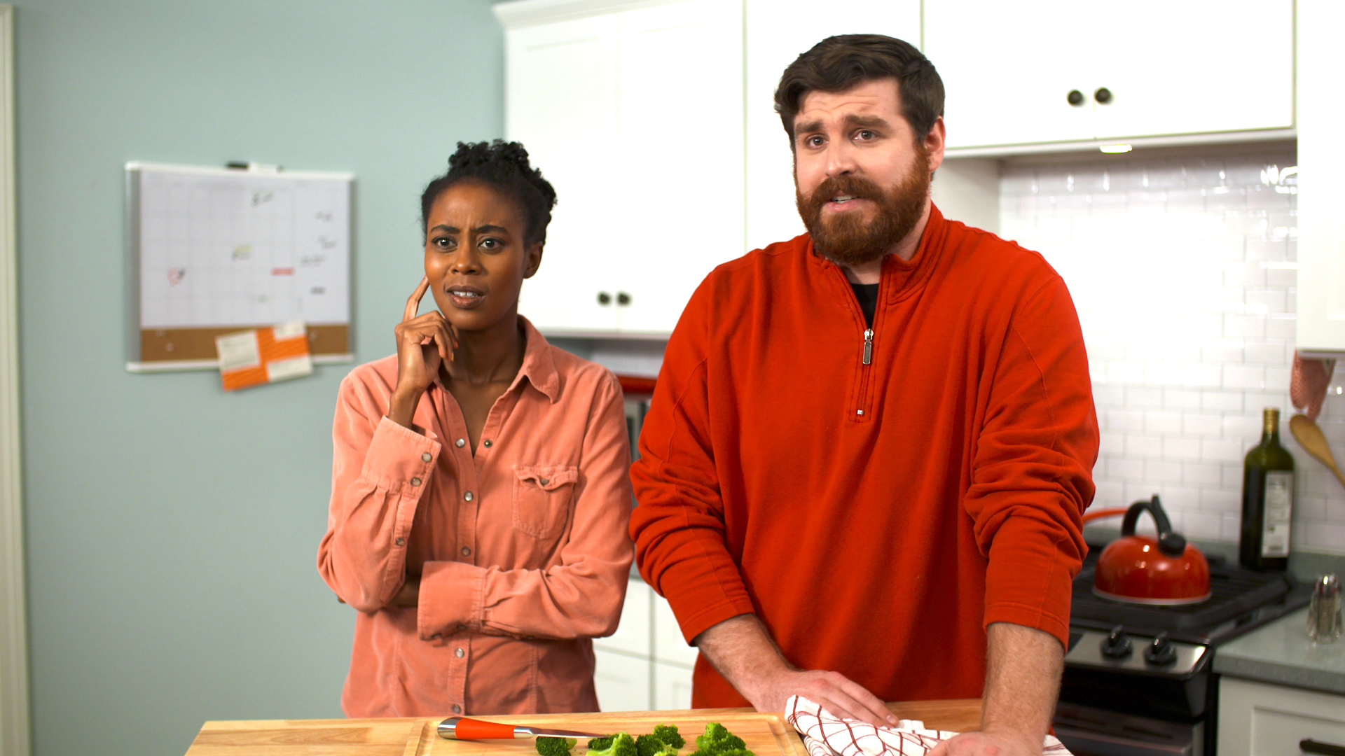 man and woman looking defeated