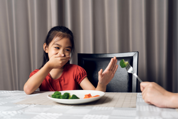 child showing picky eating